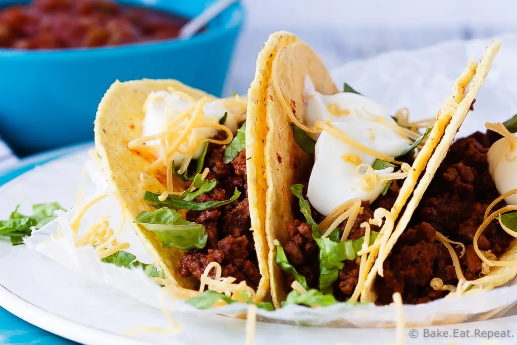 20 Minute Ground Beef Tacos - A quick and easy weeknight meal, only 20 minutes to have these fantastic ground beef tacos on the table! Plus, the prepared taco meat freezes beautifully!