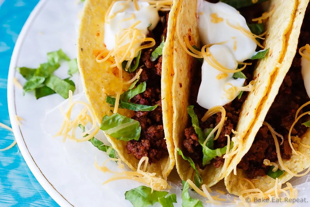 20 Minute Ground Beef Tacos - A quick and easy weeknight meal, only 20 minutes to have these fantastic ground beef tacos on the table! Plus, the prepared taco meat freezes beautifully!