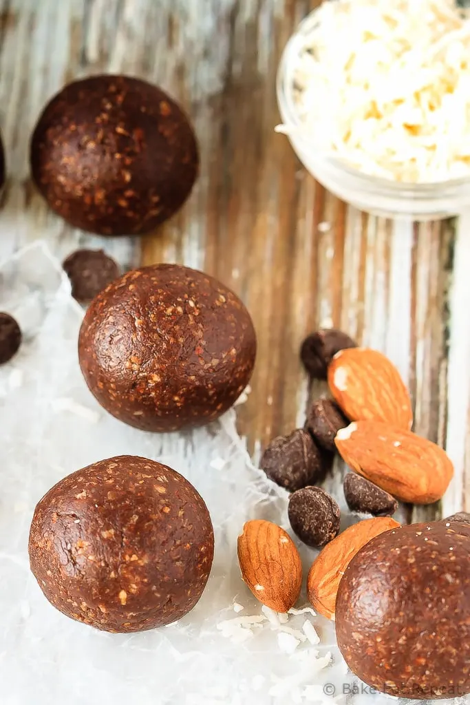 Almond Joy Energy Balls - Quick and easy almond joy energy balls that mix up in minutes and are a healthy, tasty snack full of coconut, almonds and chocolate!