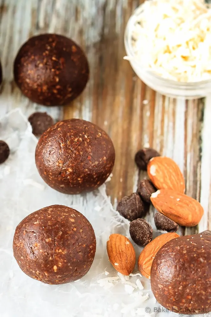 Almond Joy Energy Balls - Quick and easy almond joy energy balls that mix up in minutes and are a healthy, tasty snack full of coconut, almonds and chocolate!