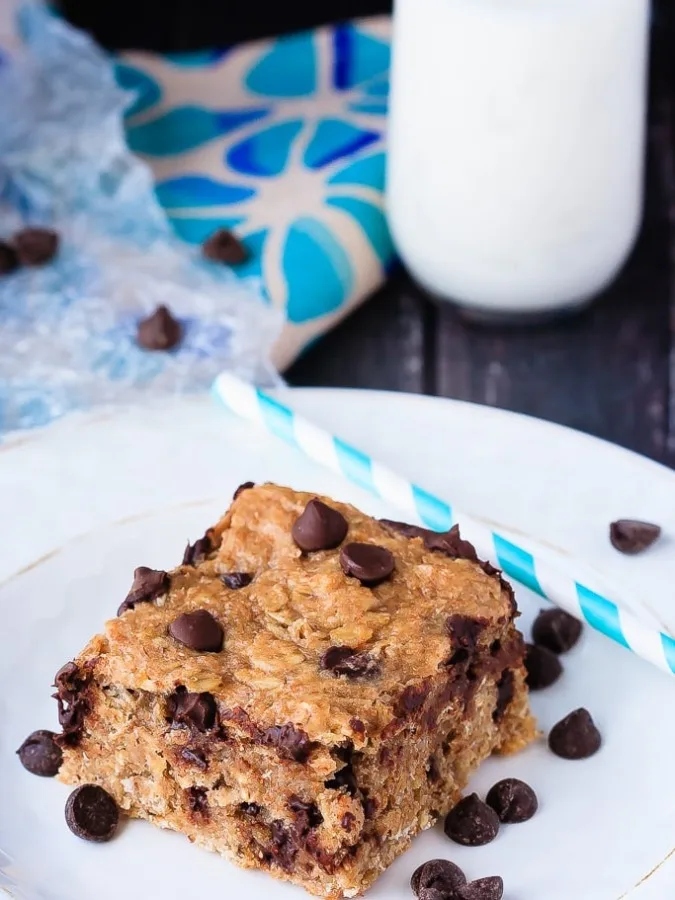 Peanut Butter Banana Oatmeal Bars - Quick and easy to make, these banana peanut butter oatmeal bars mix up in minutes and are healthy enough for an on-the-go breakfast or snack!