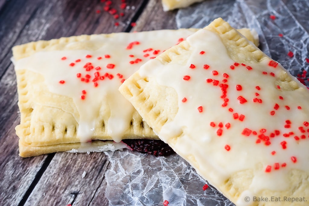Berry Pop Tarts - Easy to make homemade berry pop tarts that are better then the real thing. Flaky pastry, homemade berry filling and a sweet frosting - pie for breakfast?