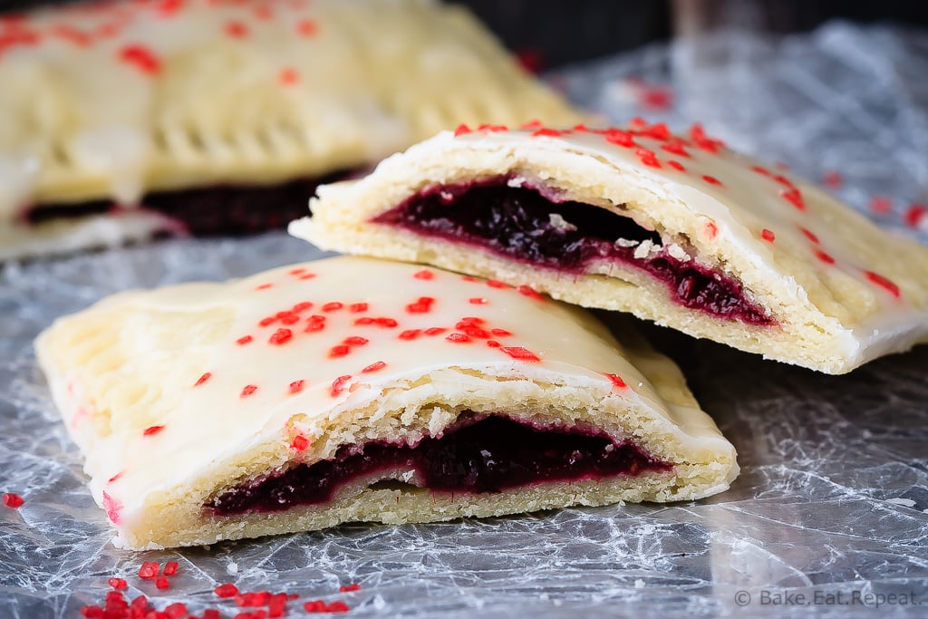 Berry Pop Tarts - Easy to make homemade berry pop tarts that are better then the real thing. Flaky pastry, homemade berry filling and a sweet frosting - pie for breakfast?