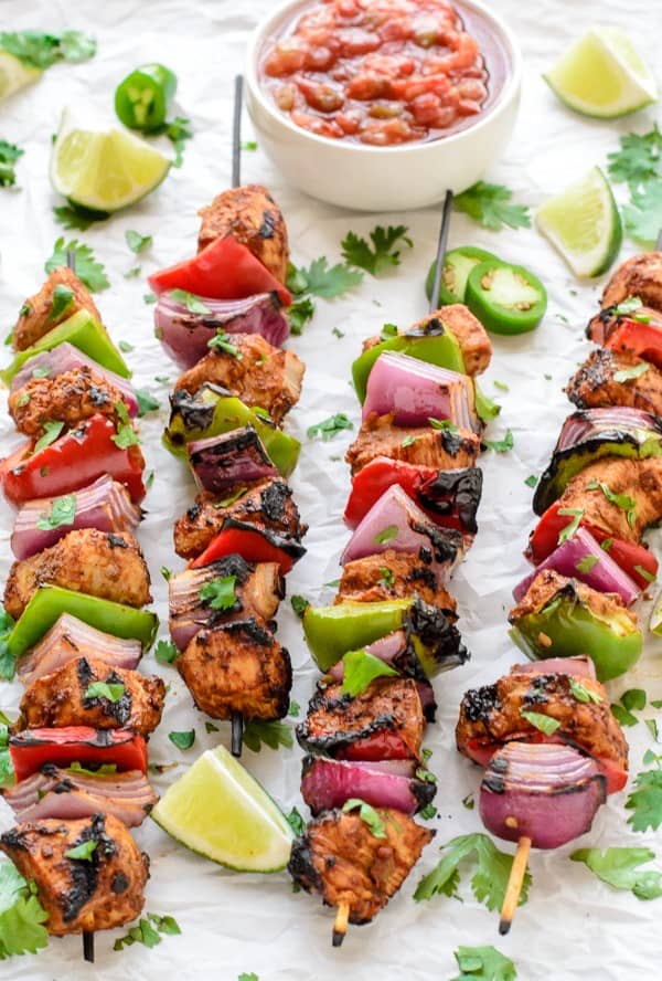 17 Grilled Kabobs for Summer - there are so many amazing grilling options here that I think we should eat food on a stick all summer long! Who's with me?!