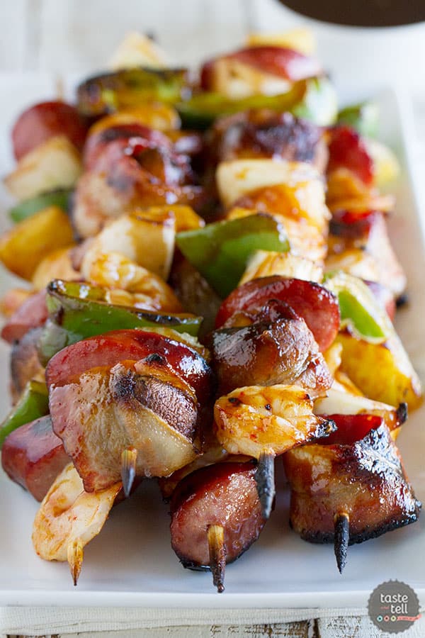 17 Grilled Kabobs for Summer - there are so many amazing grilling options here that I think we should eat food on a stick all summer long! Who's with me?!