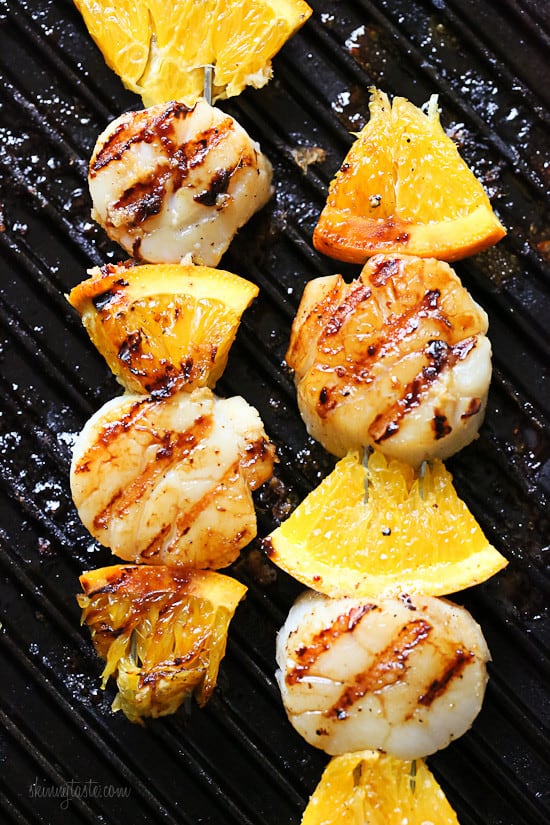 17 Grilled Kabobs for Summer - there are so many amazing grilling options here that I think we should eat food on a stick all summer long! Who's with me?!