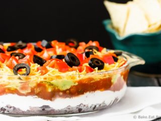 Mexican 7 Layer Dip - Quick and easy Mexican 7 layer dip - takes minutes to make and is an absolutely fantastic appetizer or snack. Everyone will love this!