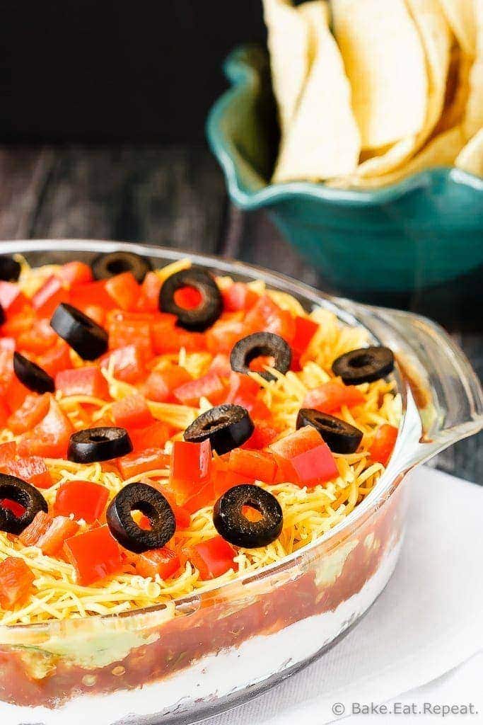 Mexican 7 Layer Dip - Quick and easy Mexican 7 layer dip - takes minutes to make and is an absolutely fantastic appetizer or snack. Everyone will love this!