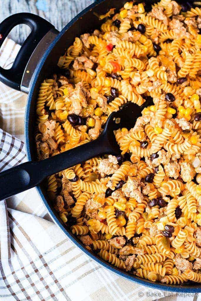 Mexican One Pan Pasta - Super fast and easy Mexican one pan pasta - it takes less than 25 minutes to have a flavourful, one pan pasta dish on the table that everyone will love!