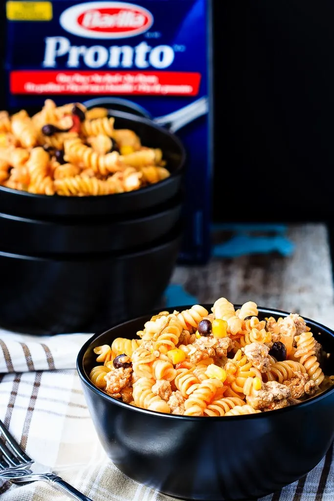 Mexican One Pan Pasta - Super fast and easy Mexican one pan pasta - it takes less than 25 minutes to have a flavourful, one pan pasta dish on the table that everyone will love!