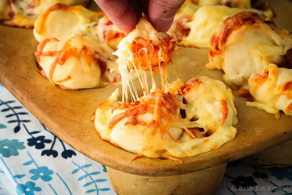 Pull Apart Pizza Muffins - Easy to make, pull apart pizza muffins that are perfect for supper or a snack, or as an easy on-the-go meal. The whole family will love these pizza muffins!