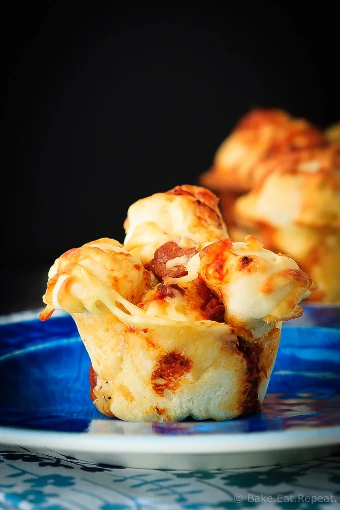 Pull Apart Pizza Muffins - Easy to make, pull apart pizza muffins that are perfect for supper or a snack, or as an easy on-the-go meal. The whole family will love these pizza muffins!