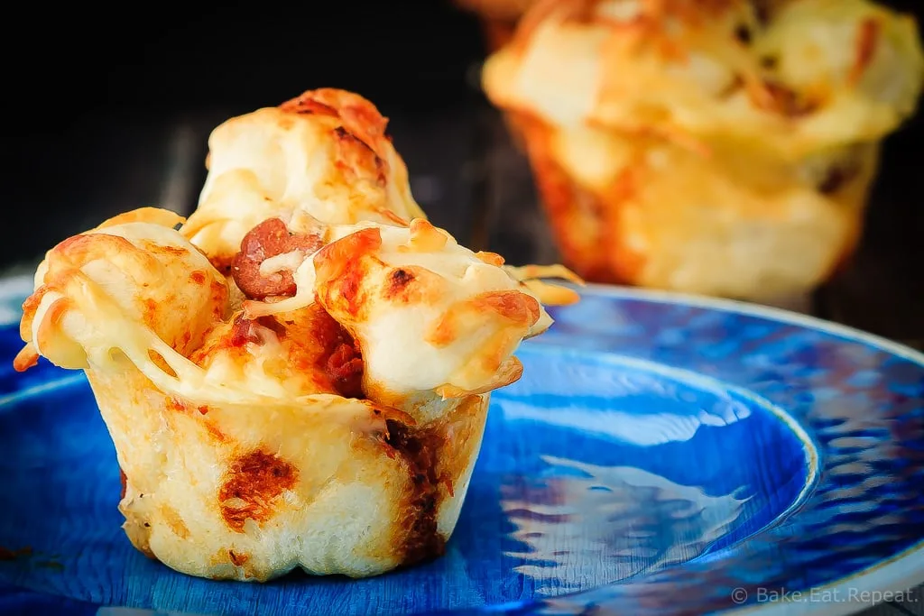 Pull Apart Pizza Muffins - Easy to make, pull apart pizza muffins that are perfect for supper or a snack, or as an easy on-the-go meal. The whole family will love these pizza muffins!