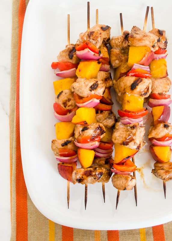 17 Grilled Kabobs for Summer - there are so many amazing grilling options here that I think we should eat food on a stick all summer long! Who's with me?!