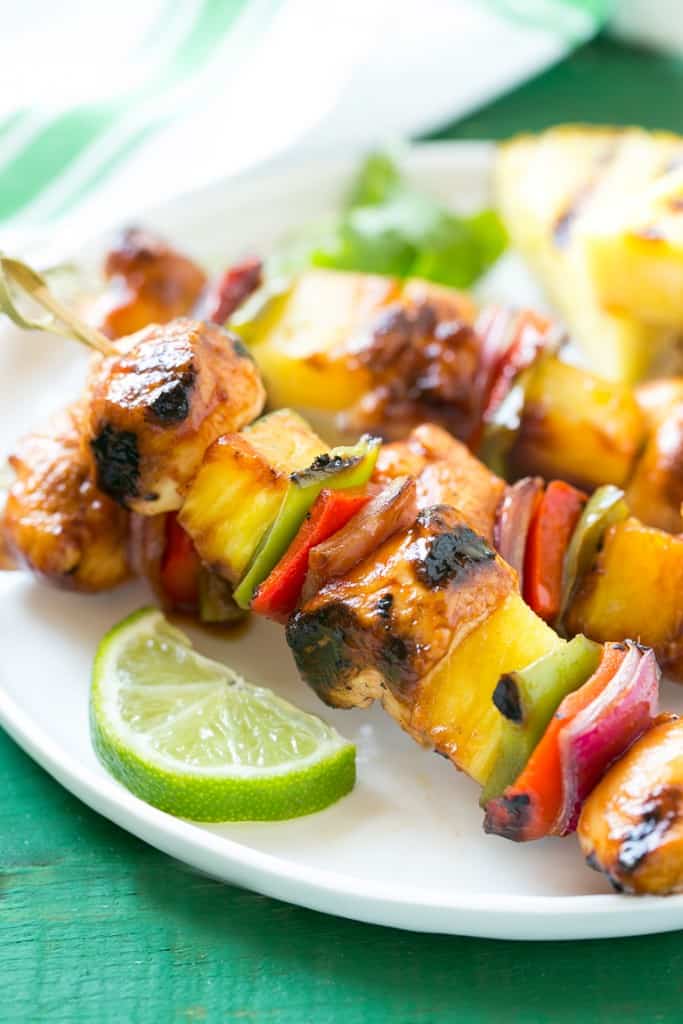 17 Grilled Kabobs for Summer - there are so many amazing grilling options here that I think we should eat food on a stick all summer long! Who's with me?!