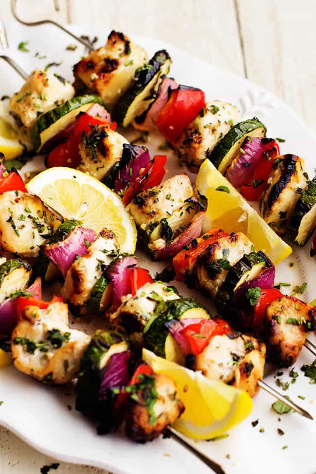 17 Grilled Kabobs for Summer - there are so many amazing grilling options here that I think we should eat food on a stick all summer long! Who's with me?!