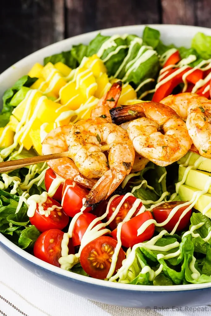 Cilantro Lime Grilled Shrimp Salad - A fantastic 30 minute meal for the summer - cilantro lime grilled shrimp salad with a creamy avocado dressing. Perfect for those summer nights.