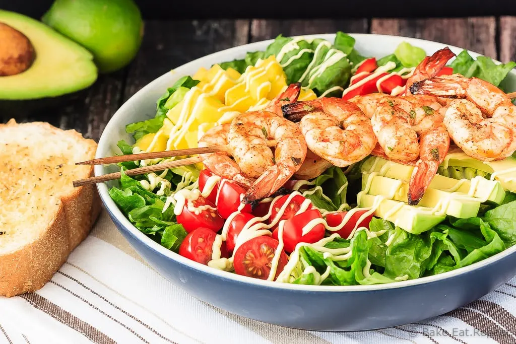Cilantro Lime Grilled Shrimp Salad - A fantastic 30 minute meal for the summer - cilantro lime grilled shrimp salad with a creamy avocado dressing. Perfect for those summer nights.