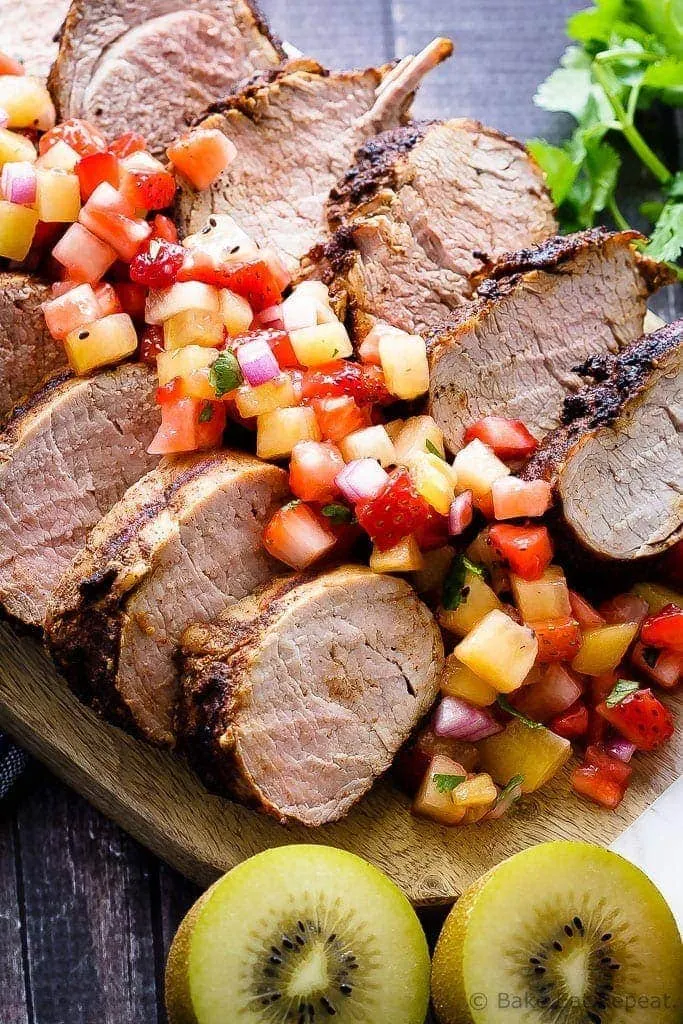 Grilled Pork Tenderloin with Strawberry Kiwi Salsa - Cinnamon chili grilled pork tenderloin with a strawberry kiwi salsa - fast and easy to make and absolutely perfect for your summer BBQ!