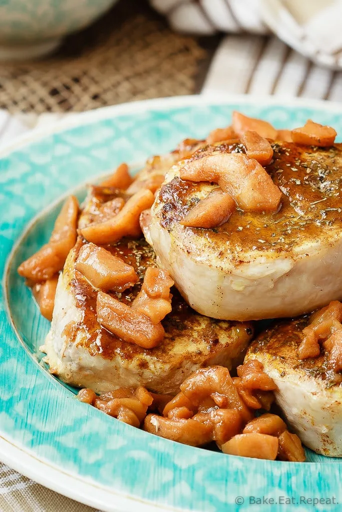 Baked Pork Chops with a Cinnamon Glaze - These baked pork chops with a cinnamon glaze are a simple, 30 minute meal that your whole family will love. Served with baked cinnamon apples and so tasty!