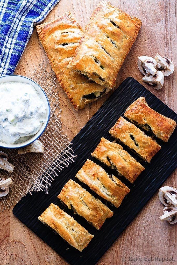 Beef Spinach and Mushroom Strudel - An easy appetizer made with puff pastry that everyone will love - this savoury strudel is filled with ground beef, mushrooms, spinach and feta cheese and served with tzatziki dip.