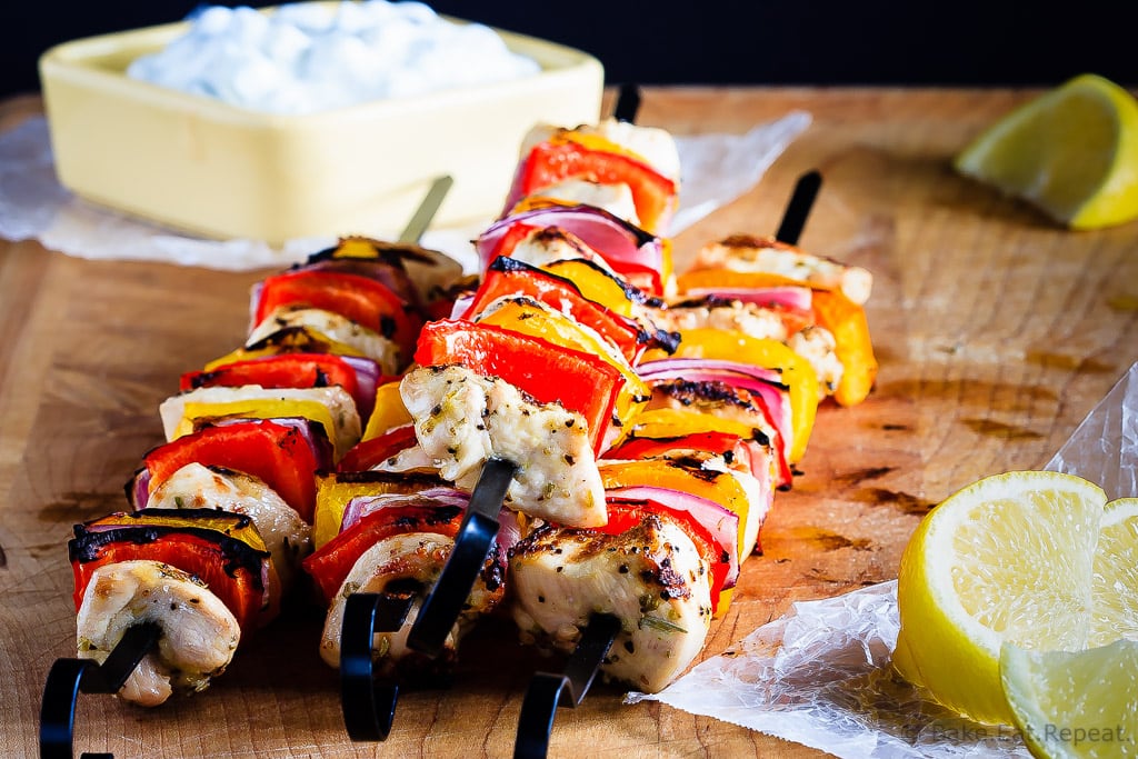 Greek Chicken Kabobs with Tzatziki Sauce - An easy, 30 minute meal for the summer, these grilled Greek chicken kabobs with tzatziki sauce are fantastic. The whole family will love them! #30MinuteThursday