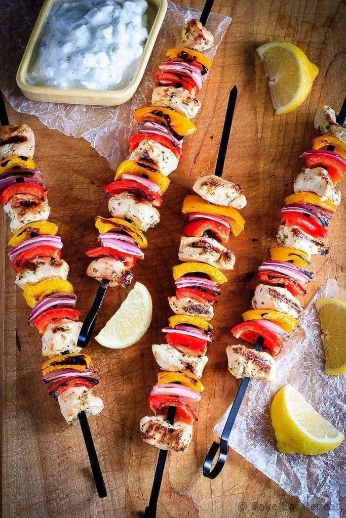 Greek Chicken Kabobs with Tzatziki Sauce - An easy, 30 minute meal for the summer, these grilled Greek chicken kabobs with tzatziki sauce are fantastic. The whole family will love them! #30MinuteThursday