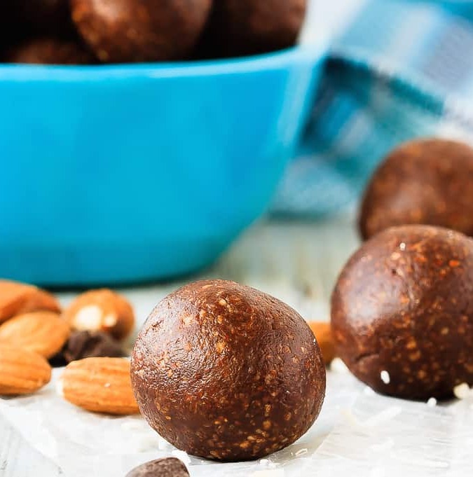 Almond Joy Energy Balls - Quick and easy almond joy energy balls that mix up in minutes and are a healthy, tasty snack full of coconut, almonds and chocolate!