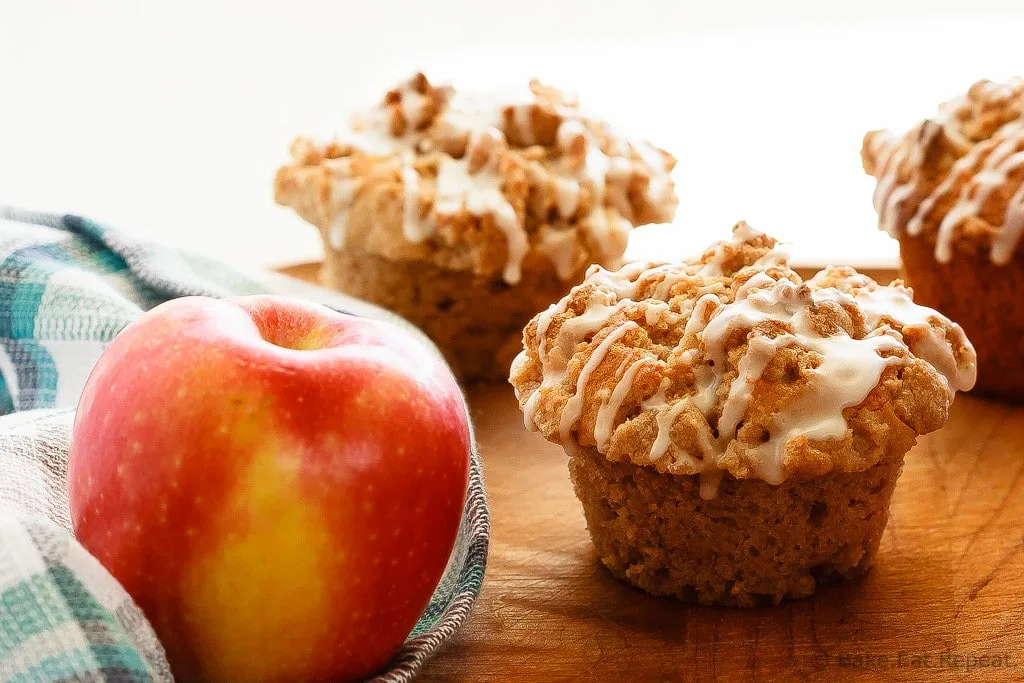 Apple Muffins with a Cinnamon Crumb Topping - Quick and easy apple muffins filled with apples and finished with a crunchy cinnamon crumb topping. The best kind of breakfast.