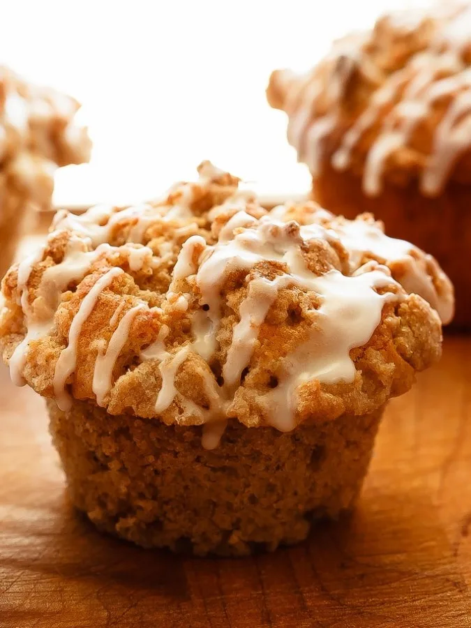 Apple Muffins with a Cinnamon Crumb Topping - Quick and easy apple muffins filled with apples and finished with a crunchy cinnamon crumb topping. The best kind of breakfast.