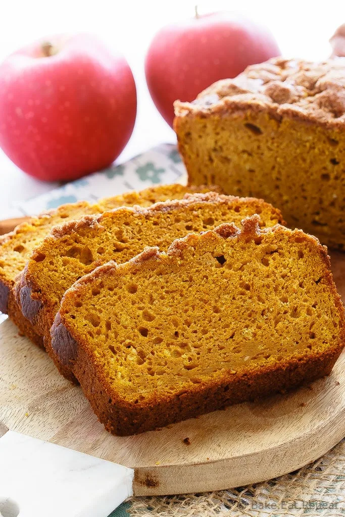 Apple Pumpkin Bread - The best pumpkin bread I've ever made, this apple pumpkin bread is super soft on the inside, has a crunchy cinnamon topping, and is full of pumpkin flavor.