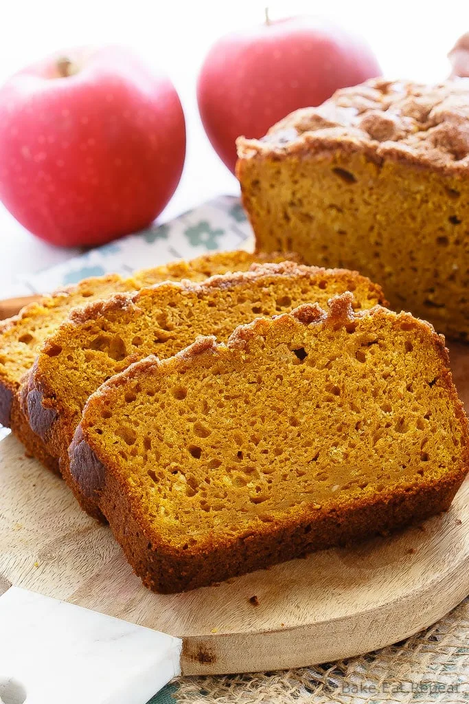 Apple Pumpkin Bread - The best pumpkin bread I've ever made, this apple pumpkin bread is super soft on the inside, has a crunchy cinnamon topping, and is full of pumpkin flavor.