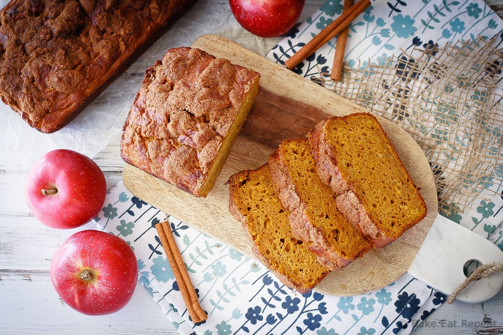 Apple Pumpkin Bread - The best pumpkin bread I've ever made, this apple pumpkin bread is super soft on the inside, has a crunchy cinnamon topping, and is full of pumpkin flavor.