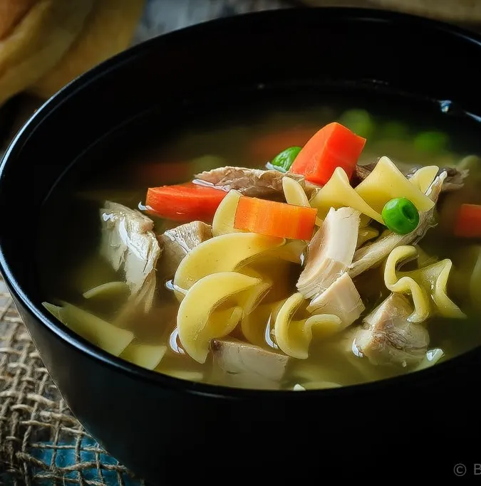 30 Minute Chicken Noodle Soup - This 30 minute chicken noodle soup is perfect with either chicken or turkey, is super fast and easy to make, and will be a family favourite for sure!