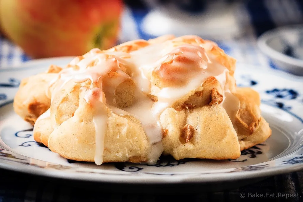 Baked Apple Fritters - These baked apple fritters are easy to make and taste amazing - soft, tender, cinnamon spiced dough studded with apples and drizzled with a vanilla glaze.