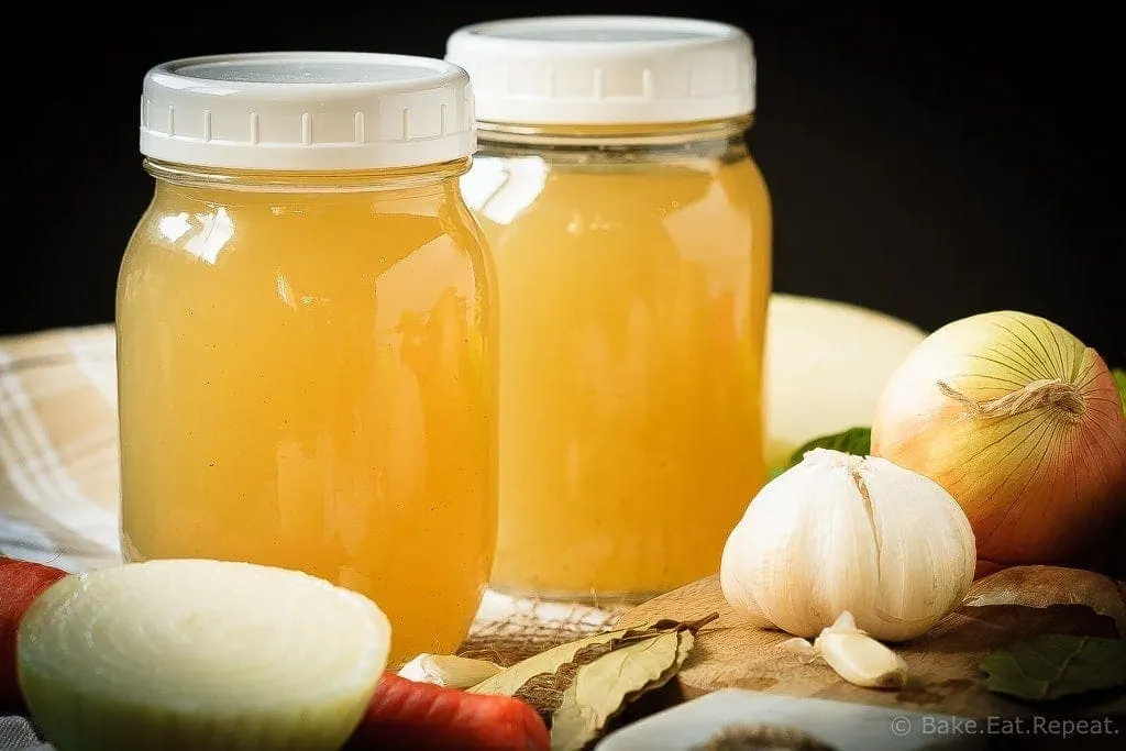 Homemade Chicken Stock - Homemade chicken stock is so easy to make, you'll wonder why you've ever bought it. Plus, it's so much tastier, and freezes well to always have on hand!