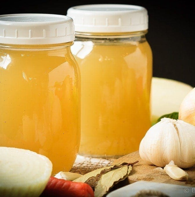 Homemade Chicken Stock - Homemade chicken stock is so easy to make, you'll wonder why you've ever bought it. Plus, it's so much tastier, and freezes well to always have on hand!