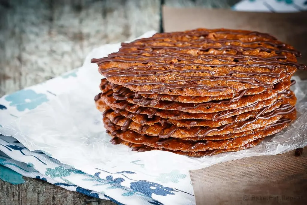 Lacey Cookies - These lacey cookies are surprisingly easy to make - made with ground pecans and drizzled with chocolate, you will have a hard time eating just one!