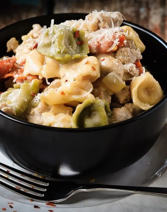 One Pot Turkey Mushroom Tortellini - Tender cheese tortellini in a creamy white sauce, this one pot turkey mushroom tortellini is a family favourite - plus it's ready in 30 minutes!