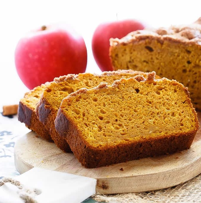 Apple Pumpkin Bread - The best pumpkin bread I've ever made, this apple pumpkin bread is super soft on the inside, has a crunchy cinnamon topping, and is full of pumpkin flavor.