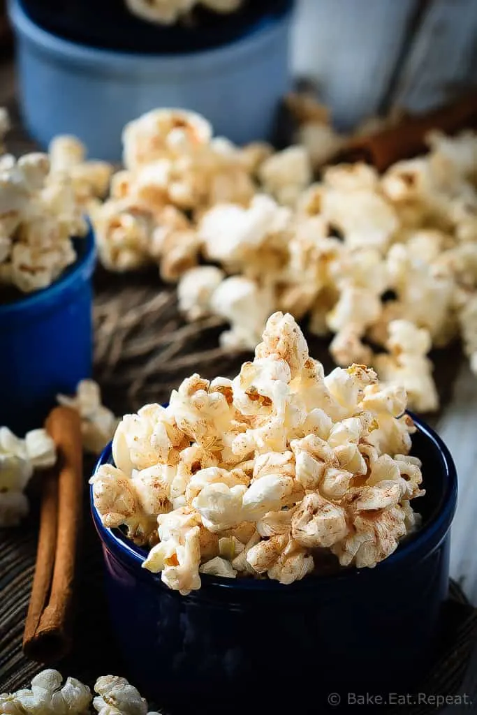 Cinnamon Roll Popcorn - A great way to change up the usual movie night snack, this cinnamon roll popcorn is a wonderful sweet and salty snack that everyone will love!