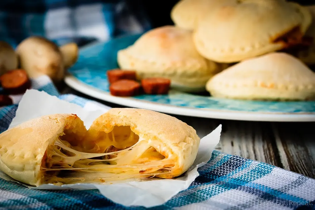 Homemade Pizza Pockets - Homemade pizza pockets that are easy to make and taste great. They're a perfect ready made snack or lunch that you can keep in the freezer!