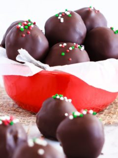 Peppermint Brownie Truffles - Rich, delicious, peppermint brownie truffles - a homemade peppermint patty filling surrounding by rich brownie crumbles and coated in chocolate!