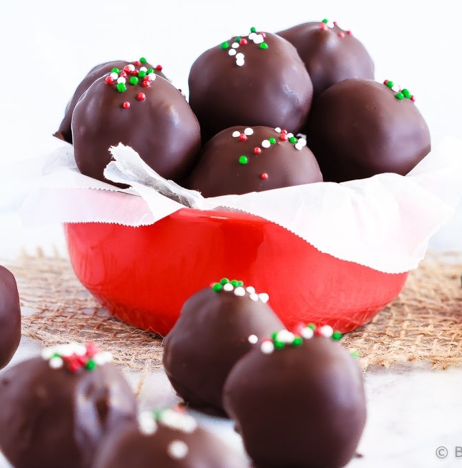 Peppermint Brownie Truffles - Rich, delicious, peppermint brownie truffles - a homemade peppermint patty filling surrounding by rich brownie crumbles and coated in chocolate!