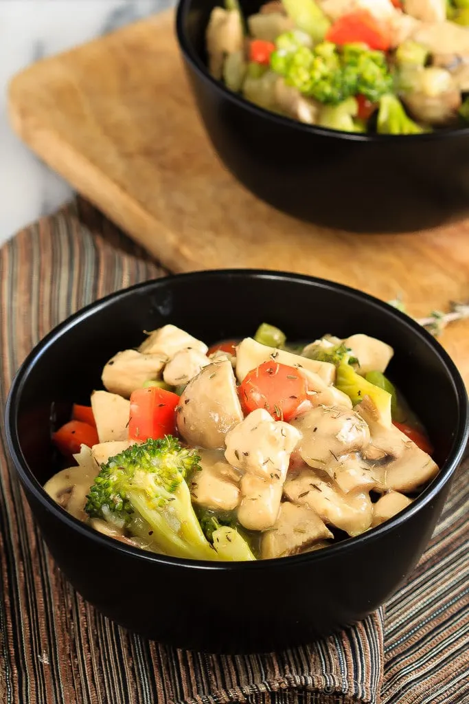 30 Minute Chicken Stew - This creamy chicken stew is filled with veggies and is simple to make. Easily on the table in 30 minutes, it’s a healthy meal that is perfect for those cold nights!