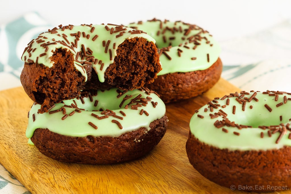 Chocolate mint doughnuts that are baked, not fried, and mix up in minutes! Make some dense, chocolate cake doughnuts topped with mint icing for dessert!