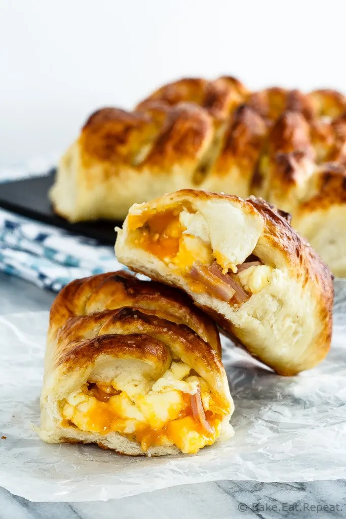 These braided ham, egg and cheese pretzel rolls are the perfect hand held meal. Plus they're easy to take along with you for breakfast or lunch on the go!