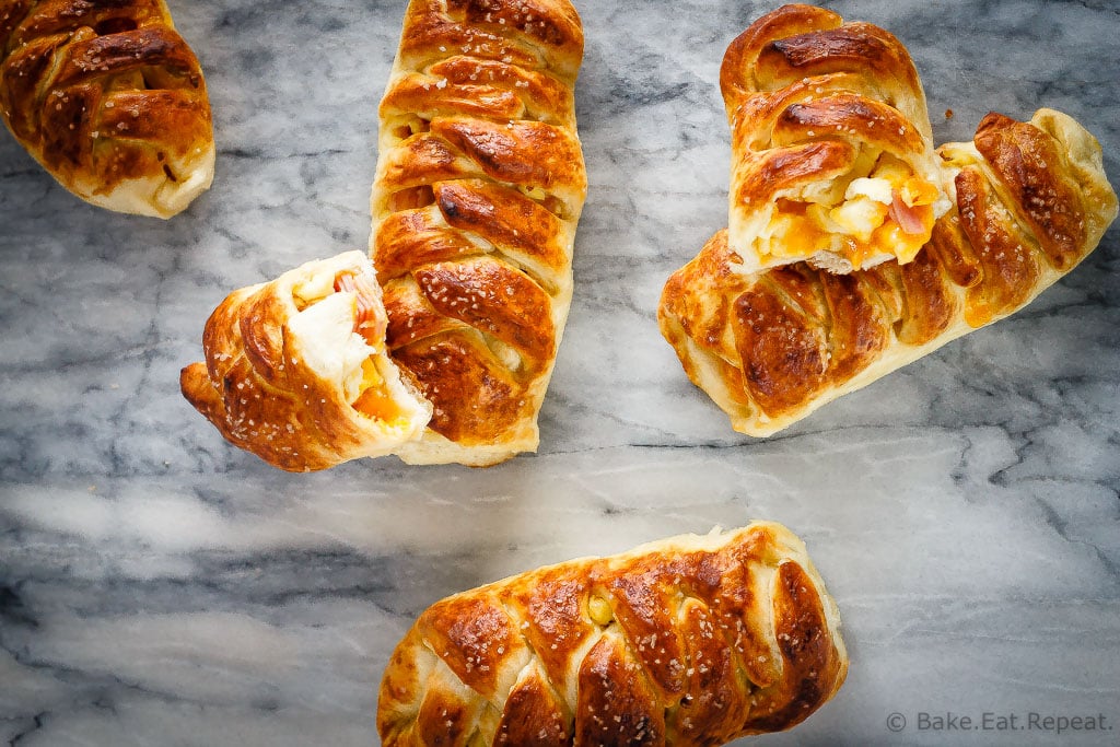 These braided ham, egg and cheese pretzel rolls are the perfect hand held meal. Plus they're easy to take along with you for breakfast or lunch on the go!