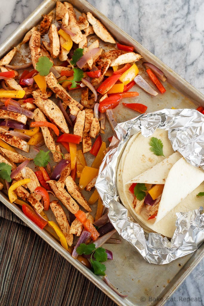 Quick and easy chicken fajitas with just one sheet pan to clean afterwards! This is my new favourite way to make one of my family's favourite meals!