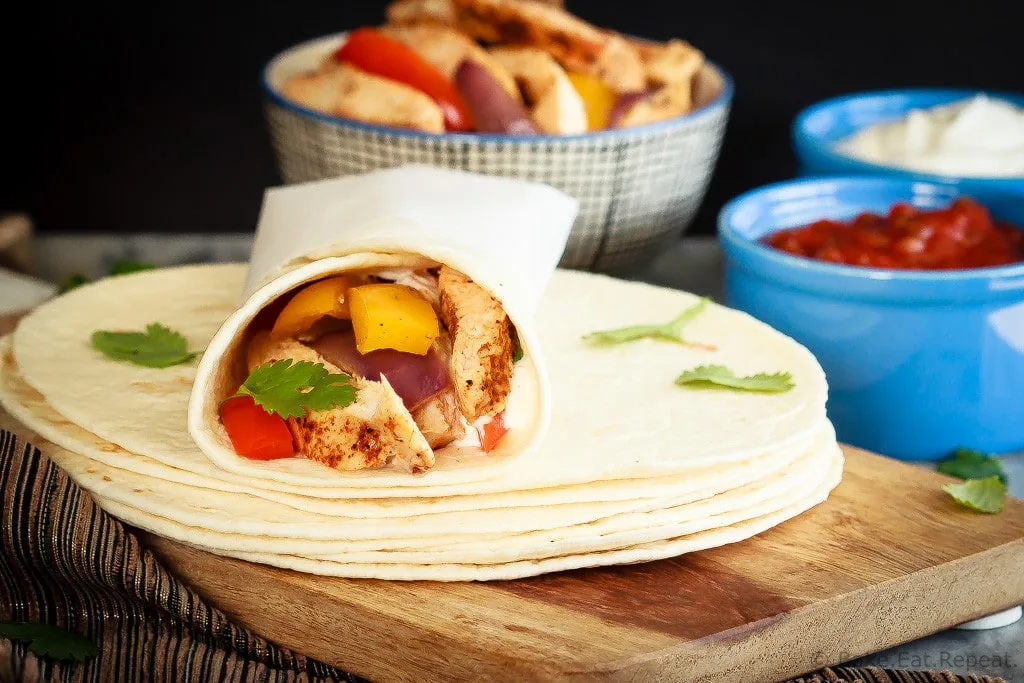 Quick and easy chicken fajitas with just one sheet pan to clean afterwards! This is my new favourite way to make one of my family's favourite meals!